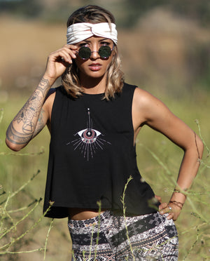 Lightweight black crop tank with a perfect flow. Abstract eye design with vintage style and earth tone colors