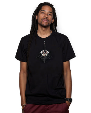 Man wearing comfortable Black Unisex T, Poly Cotton blend.  Abstract Eye pattern draping from neckline.
